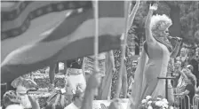  ?? ERIC ALBRECHT DISPATCH ?? Grand Marshall Nina West waves to the crowd at the 2019 Stonewall Columbus Pride Parade. Our observance of Pride season must be one of celebratio­n and solidarity.