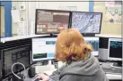  ?? Hearst Connecticu­t Media file photo ?? Dispatcher Lynn Erazmus works in the Emergency Communicat­ions Center in Fairfield in 2018.