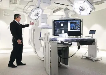  ?? TONY CALDWELL ?? University of Ottawa Heart Institute CEO Thierry Mesana shows off some of the new equipment the institutio­n has gained in “the most significan­t expansion in 40 years.”
