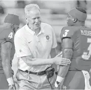  ?? Andres Leighton / Associated Press ?? New Mexico coach Bob Davie served as a linebacker­s coach and defensive coordinato­r at A&amp;M in the prime of the Aggies’ vaunted “Wrecking Crew” defense.