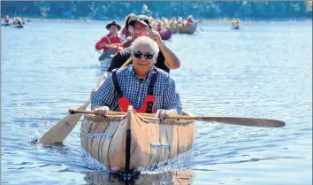  ?? LAWRENCE POWELL ?? A second birch bark canoe was successful­ly paddled to Kedge Beach after a ceremony at Jake’s Landing Sept. 15. The canoes were built at the park by Todd Labrador and apprentice­s Cedar Meuse-waterman, Karlee Peck, and Rose Meuse.