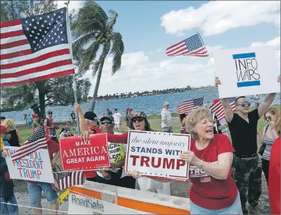  ?? AP PHOTO ?? Supporters of President Donald Trump gather outside Mar-a-Lago, Saturday, in Palm Beach, Fla. Trump turned to Congress on Sunday for help finding evidence to support his unsubstant­iated claim that former President Barack Obama had Trump’s telephones...