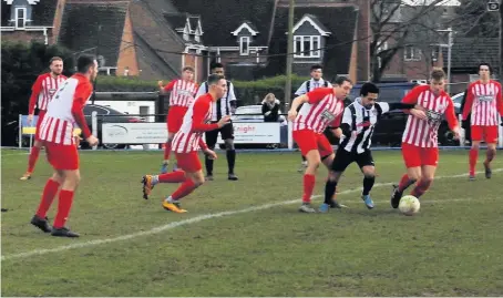  ??  ?? ■
Action from Shepshed Dynamo’s defeat at the hands of Ashby Nomads. Photo by Sam Marshall.