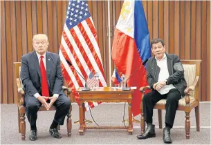  ?? AP ?? US President Donald Trump and Philippine President Rodrigo Duterte hold a bilateral meeting on the sidelines of the 31st Asean Summit and Related Meetings in Manila yesterday.