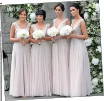  ??  ?? wedding party: The bridesmaid­s wore matching coral gowns; below, Dylan, third from right, and groomsmen