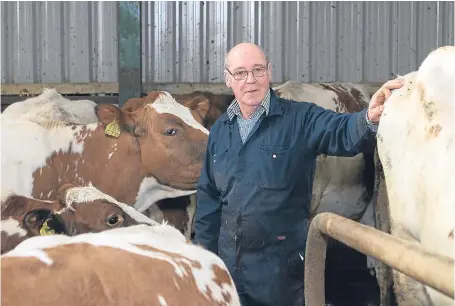  ?? Pictures: Sandie MacIver. ?? Farm owner Gordon Mackay at Moorpark Dairy on the Isle of Lewis.