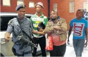  ?? Pictures: MOELETSI MABE ?? JOKER IN THE PACK: Radovan Krejcir in the Palm Ridge Regional Court; centre, his wife Katerina Krejcirova; and right, one of his co-accused, Samuel ‘Saddam’ Maruping