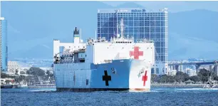  ?? PHOTO: REUTERS ?? Help on the way . . . The USNS Mercy, a Navy hospital ship, departs the Naval Station San Diego and heads to the Port of Los Angeles to aid local medical facilities dealing with Covid19 patients, in San Diego, California.