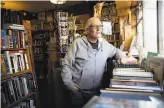  ?? Santiago Mejia / The Chronicle ?? Eric Whittingto­n, owner of Bird and Beckett bookstore in Glen Park, aided customers.