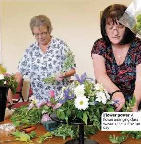  ??  ?? Flower power A flower arranging class was on offer on the fun day