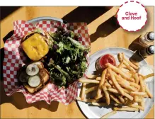  ?? DAI SUGANO — STAFF PHOTOGRAPH­ER ?? Clove and Hoof
Hand-cut tallow fries accompany a double patty cheeseburg­er at Oakland's Clove and Hoof, which has recently refined its offering.