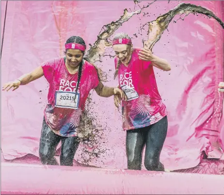  ?? ?? MUDDY MARVELS Cancer Research UK’s 50 per cent off entry fee offer during January