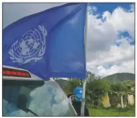  ??  ?? A U.N. vehicle with a U.N. flag is seen inside the U.N.-controlled buffer zone dividing Cyprus.