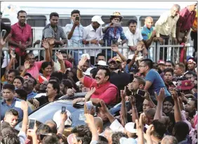  ?? REUTERS ?? Former Sri Lankan President Mahinda Rajapaksa waves at his supporters during an antigovern­ment protest in Colombo, Sri Lanka on 5 September 2018.