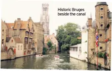  ??  ?? Historic Bruges beside the canal