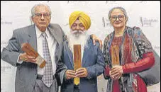  ?? HT PHOTO ?? Dhahan Prize for Punjabi Literature winner Balwinder Singh Grewal with other finalists Javed Boota (left) and Arvinder Kaur.