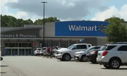  ?? Photograph: Erik Verduzco/AP ?? The Walmart parking lot in Lincolnton, North Carolina, where six people were struck by a vehicle.