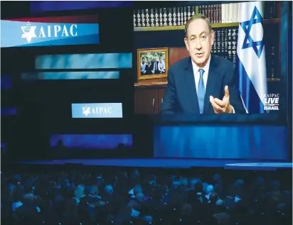  ?? (Joshua Roberts/Reuters) ?? PRIME MINISTER Benjamin Netanyahu speaks via video link to American Israel Public Affairs Policy Conference in Washington last year.