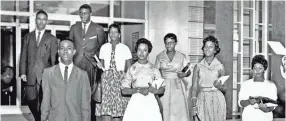  ?? THE COMMERCIAL APPEAL FILE ?? The Memphis State Eight in September, 1959. Left to right, Ralph Prater, Luther Mcclellan (foreground), John Simpson, Eleanor Gandy, Sammie Burnett, Bertha Mae Rogers, Marvis Laverne Kneeland, and Rose Blakney. These young people, later christened the Memphis State Eight, made history as the first African-americans to attend what is now the University of Memphis.