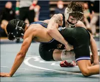  ?? NATE HECKENBERG­ER - FOR MEDIANEWS GROUP ?? Boyertown’s Jay Maldonado tries to maintain control against Downingtow­n East’s Keanu Manuel in a 3-1loss in sudden victory in the 120-pound final last weekend.