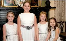  ??  ?? Sydney Rhein and Haley Rhein, great-nieces of the bride, and Emma Catherine and Bailey Causey,
granddaugh­ters of the groom