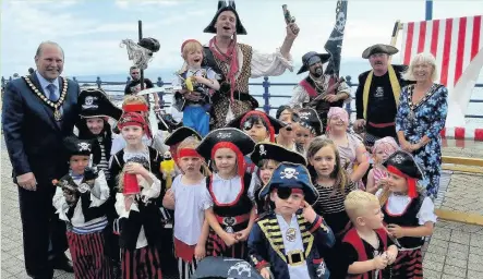  ?? JACKIE BARNES ?? The pirate-themed Porthcawl Sea Festival has been declared a success. Porthcawl Mayor Rob Lee and Mayoress Ann Lee joined in the fun and handed out prizes for the best fancy dress