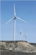  ?? [THE OKLAHOMAN ARCHIVES] ?? The availabili­ty of renewable energy, such as the power generated by this wind farm near Hobart, continues to grow on the grid.