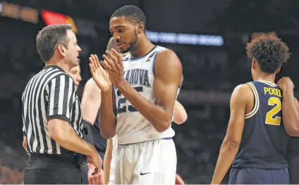  ?? Kin Man Hui / Kin Man Hui/San Antonio Express-News ?? Mikal Bridges helped Villanova win its second NCAA championsh­ip in three years. The 6-foot-7 wing, who averaged 17.7 points and 5.3 rebounds in his junior season, is also regarded as a top defender and possibly the top wing in the 2018 NBA draft.
