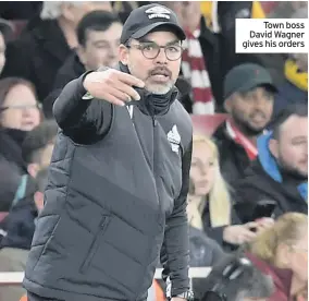  ??  ?? Town boss David Wagner gives his orders