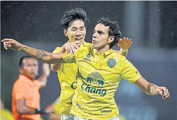  ??  ?? Buriram’s Diogo Luis Santo celebrates after scoring a goal.