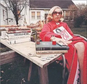  ??  ?? Dorothy Gilbert Friedman, an avid reader, in her backyard in 1979