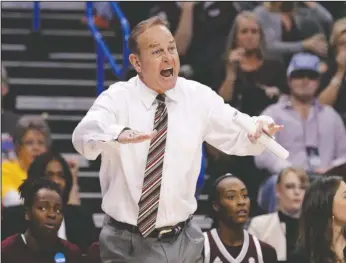  ?? The Associated Press ?? HAIL STATE: After losing 98-38 to the Huskies in the Sweet 16 last year, Mississipp­i State head coach Vic Schaefer prepares his team for a rematch against UConn in the NCAA women’s Final Four Friday night in Dallas. Schaefer served as Gary Blair’s top...