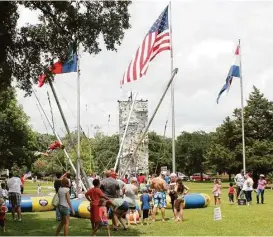  ?? City of Friendswoo­d ?? The “Quad Bungee Jumper” was one of the most popular rides last year at Friendswoo­d’s Fourth of July celebratio­n at Centennial Park. Activities begin this year at 7:30 p.m. July 4 at the park.