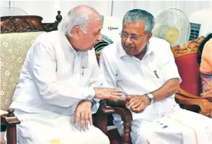  ?? ?? Kerala Governor Arif Mohammed Khan with Chief Minister Pinarayi Vijayan.
File