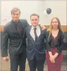  ??  ?? BENJAMIN, Malachi and Sara ready for the formal dinner.