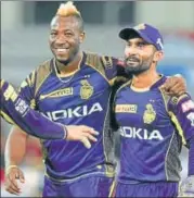  ?? AFP ?? Knight Riders captain Dinesh Karthik (right) has shown the way by emerging the highest scorer with 412 runs.