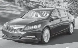  ?? Acura photo ?? The RLX Sport Hybrid SH-AWD uses a total of three electric motors.