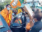  ?? — DC ?? Union minister for tourism and culture G. Kishan Reddy greets party supporters during the Jan Ashirwad Yatra at Kodad on Thursday.