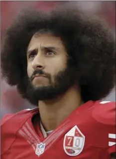  ??  ?? In this Dec. 11, 2016, file photo, San Francisco 49ers quarterbac­k Colin Kaepernick stands in the bench area during the second half of the team’s NFL football game against the New York Jets in Santa Clara. AP PHOTO/MARCIO JOSE SANCHEZ