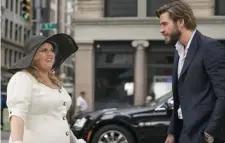  ??  ?? Rebel Wilson, left, and Liam Hemsworth in a scene from the film, ‘Isn’t It Romantic.’