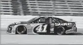  ?? [LARRY PAPKE/THE ASSOCIATED PRESS] ?? Kurt Busch heads down the front stretch during a practice session Friday at Texas Motor Speedway in Fort Worth, Texas.