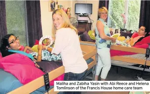  ??  ?? Maliha and Zabiha Yasin with Abi Reece and Helena Tomlinson of the Francis House home care team