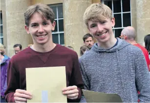  ??  ?? Twins Rupert and Henry Carr achieved an impressive seven A*s and one A between them