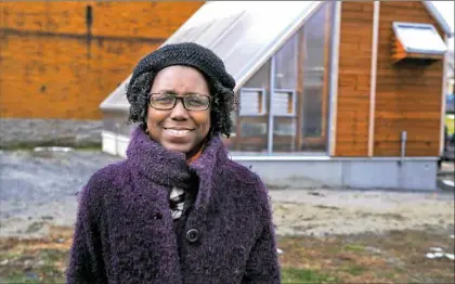  ?? Nate Guidry/Post-Gazette ?? Stephanie Boddie is co-leader of the Oasis Foods Demonstrat­ion Project, which is developing a solar-powered greehnouse and fishery on Fluery Way in Homewood.