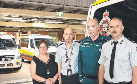  ?? Picture: Bev Lacey ?? VIOLENT ASSAULT: Condemning the attacks are (from left) United Voice delegate Ginny Lovelady, QAS executive manager operations Rob Alexander, Advanced Care Paramedic Winston Lobegeier and Assistant Commission­er Stephen Zsombok.