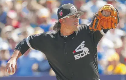  ?? | AP PHOTOS ?? Right- hander Carson Fulmer ( above) has struggled this spring, with an 18.90 ERA heading into a start Monday against the Diamondbac­ks. Left- hander Hector Santiago, on the other hand, has allowed one run in 10 spring innings.