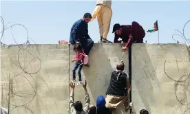  ?? Agency/Getty Images ?? Afghans at Hamid Karzai airport in August, trying to flee Kabul. Photograph: Anadolu