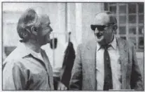  ?? NEW MEXICAN CLIPPING ?? Reilly Johnson, left, in a photograph that appeared with a 1994 article in The New Mexican. He’s speaking with Bruce Kaufman at a banquet at the Penitentia­ry of New Mexico.