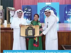  ?? ?? Al Mutairi and Sheikha Sheikha Al Sabah honor Al Khashti for Zain’s support.