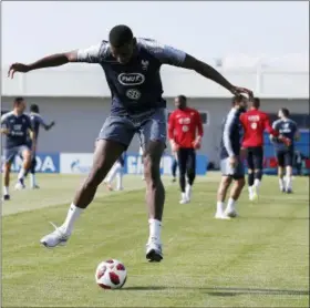  ?? DAVID VINCENT — THE ASSOCIATED PRESS ?? France’s Paul Pogba dribbles the ball during a training session at the 2018 World Cup in Glebovets, Russia, Thursday.